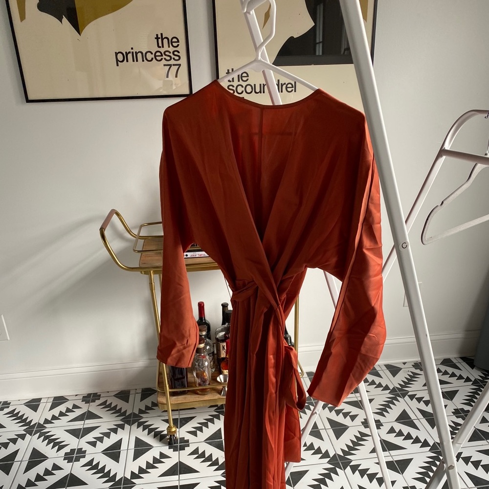 Floor length rust colored dress with tie